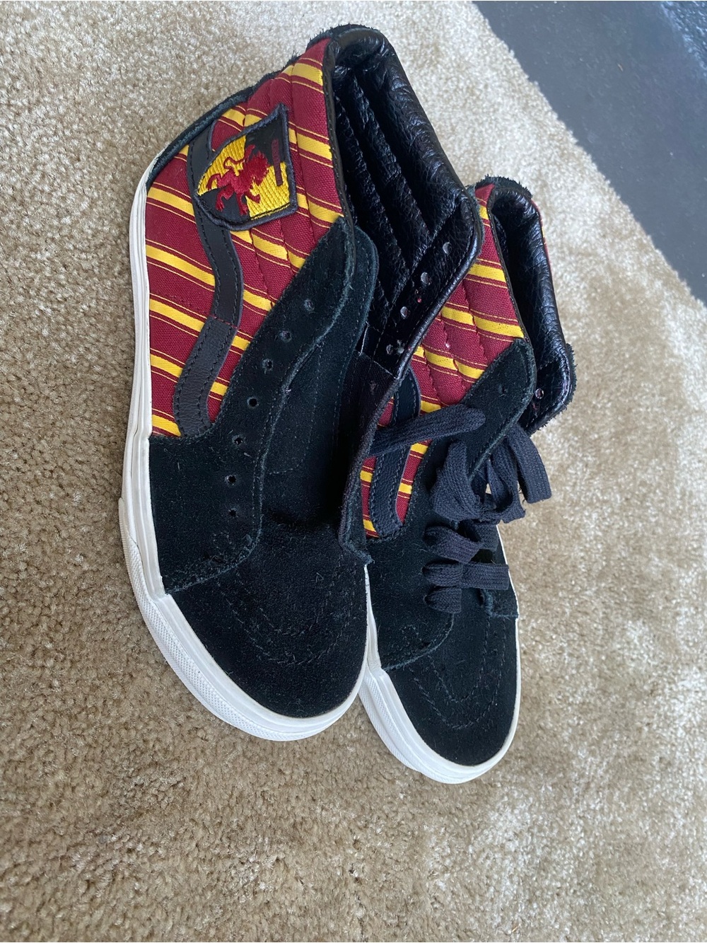 Vans Black High-Top Sneakers with Red and Yellow Stripes
